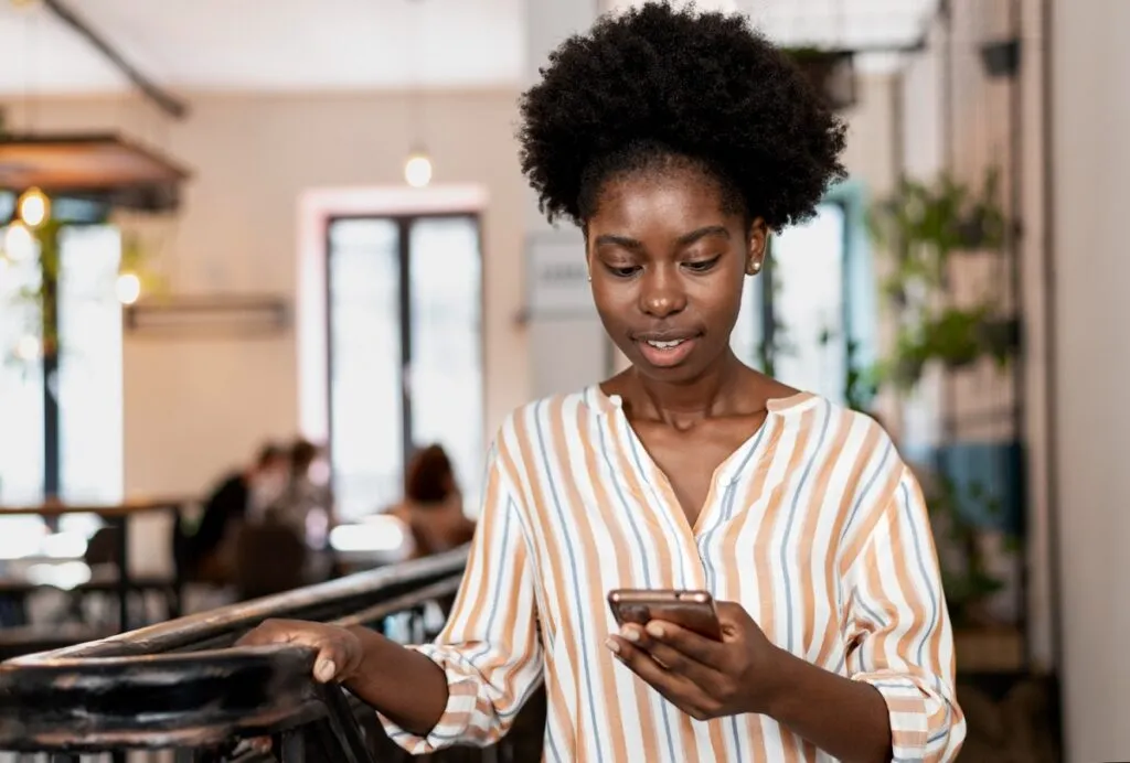 woman checking her smartphone no